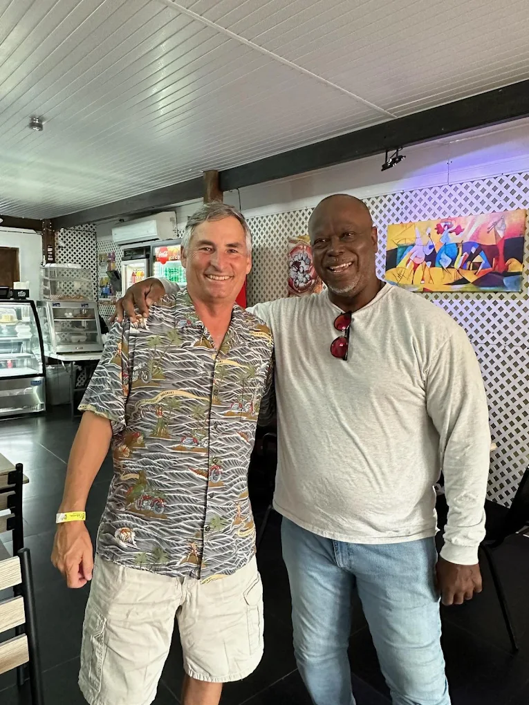Uncle Bob with a guest inside the restaurant